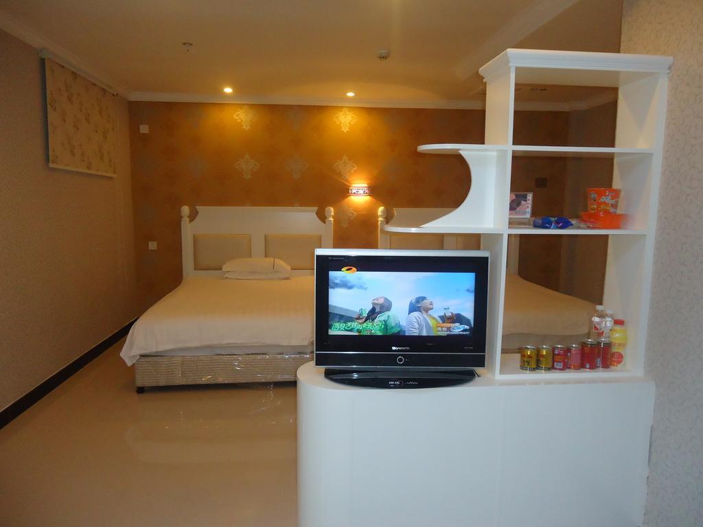 Omeiga Business Hotel Yiwu (Zhejiang) Oda fotoğraf