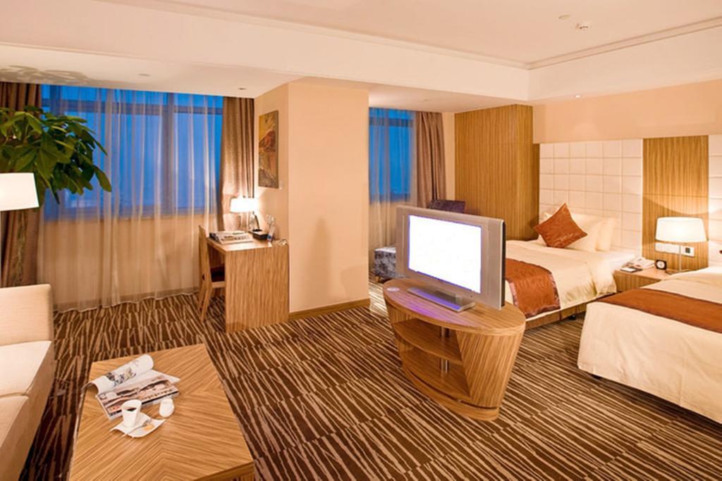 Omeiga Business Hotel Yiwu (Zhejiang) Oda fotoğraf