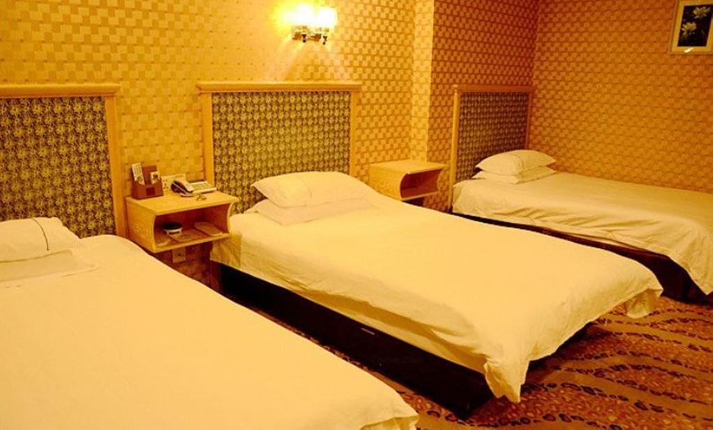 Omeiga Business Hotel Yiwu (Zhejiang) Oda fotoğraf