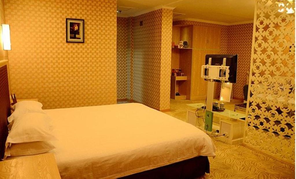 Omeiga Business Hotel Yiwu (Zhejiang) Oda fotoğraf