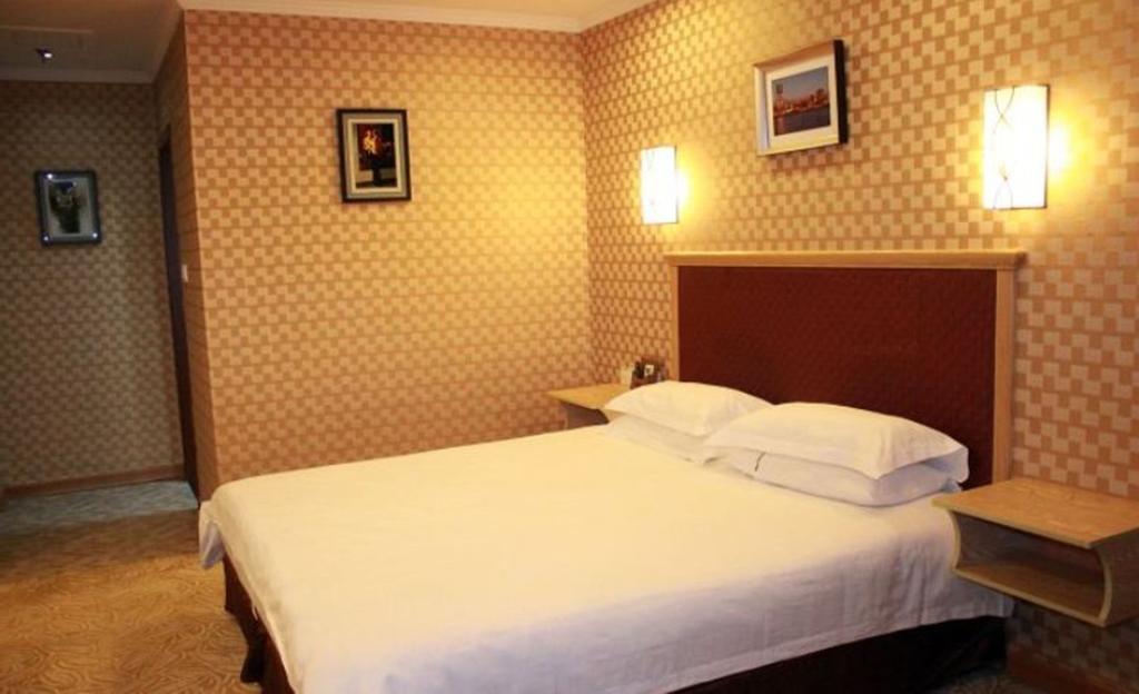 Omeiga Business Hotel Yiwu (Zhejiang) Oda fotoğraf